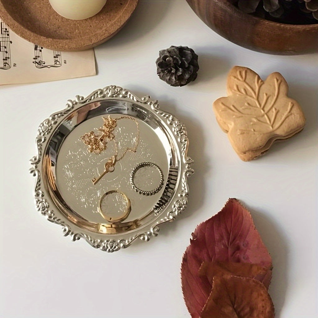 This Retro Carved Metal Small Tray doubles as an Aromatherapy Candle Holder and Jewelry Ornament in a Palace Style Coffee Shop, perfect for using as a Photo Prop or displaying delicate jewelry.