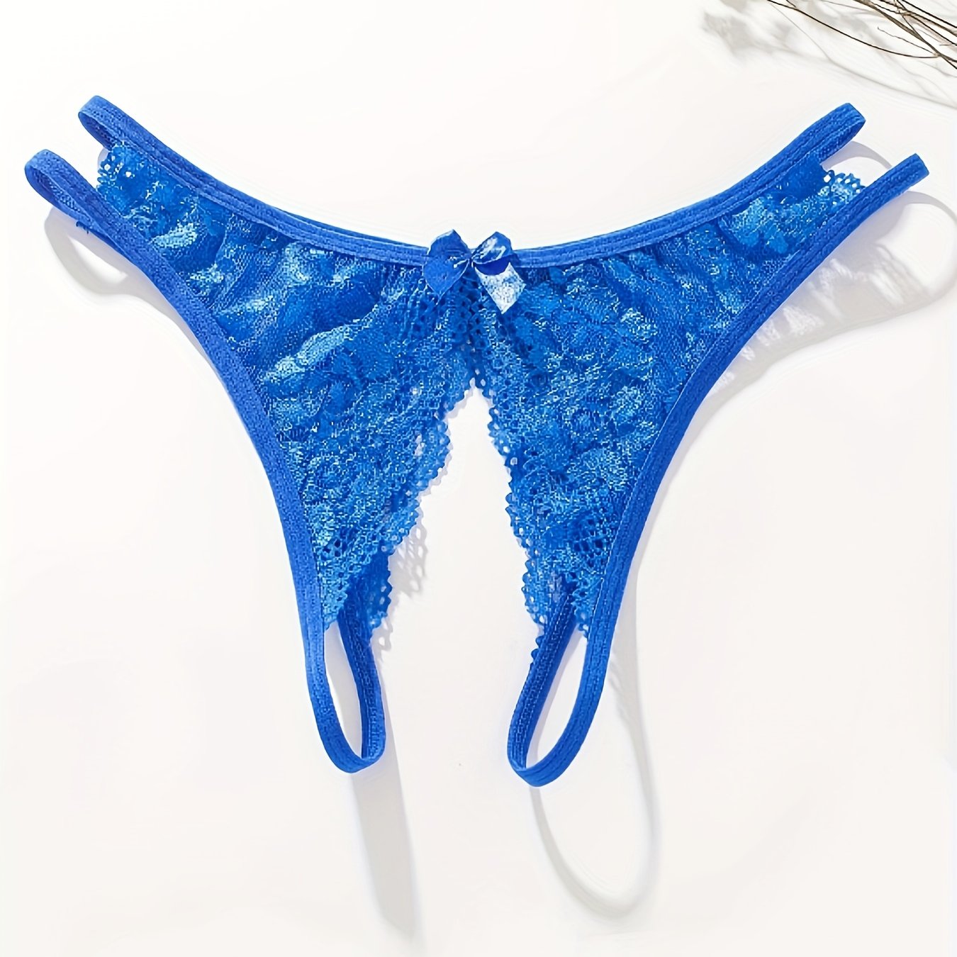 Floral lace thong with open crotch and bow detail - Women's lingerie.