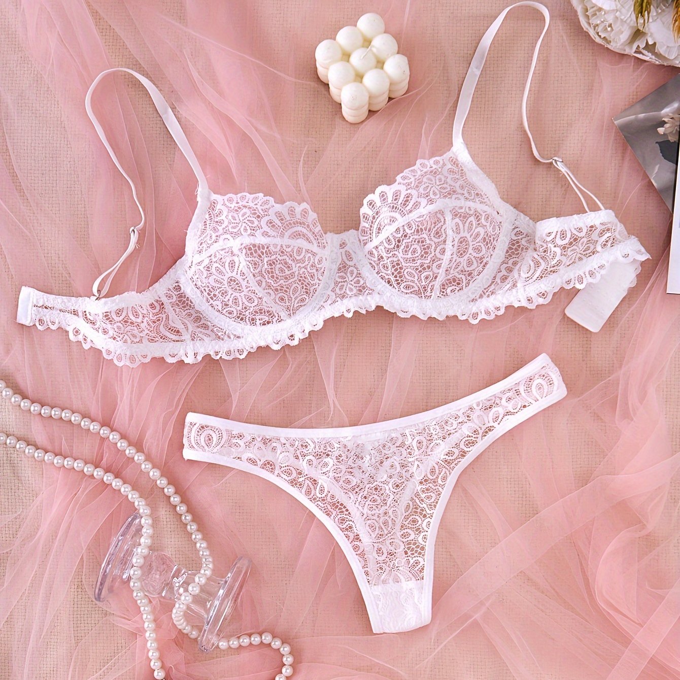 Lace bra and panty set with mesh details, revealing yet comfortable design.