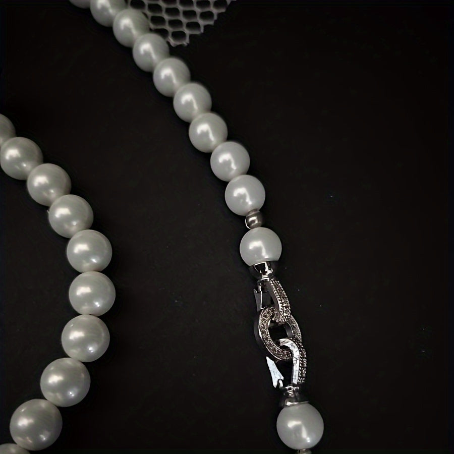 Impeccably crafted from natural freshwater pearls measuring 7-8mm, this stunning necklace features a silvery diamond round buckle. Presented in an elegant gift box, it is suitable for both male and female recipients and perfect for everyday wear