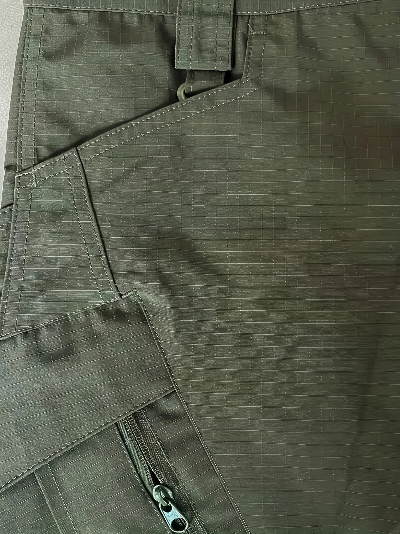 Men's waterproof cargo pants for outdoor activities.