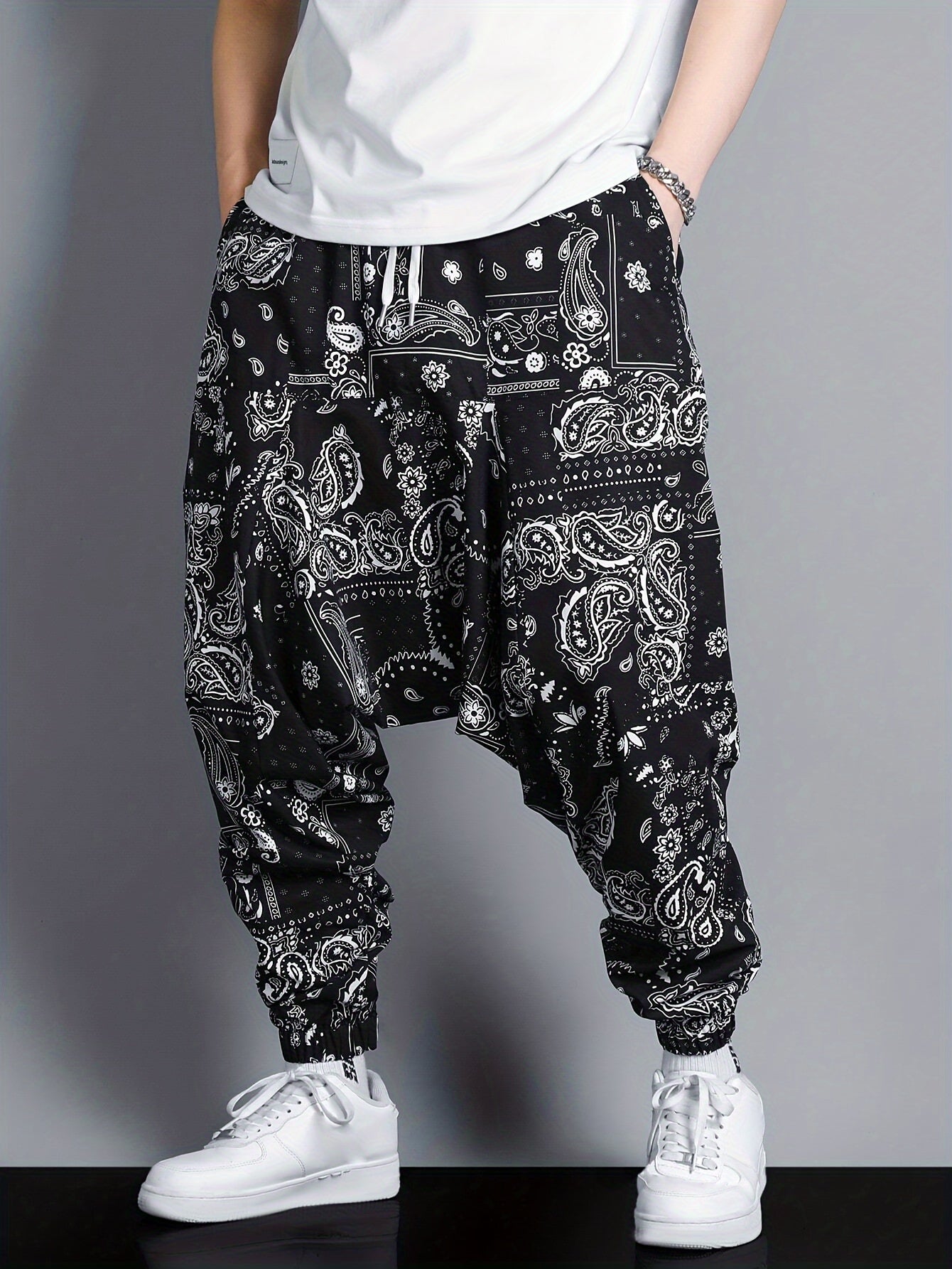 Men's oversized joggers featuring paisley pattern print.