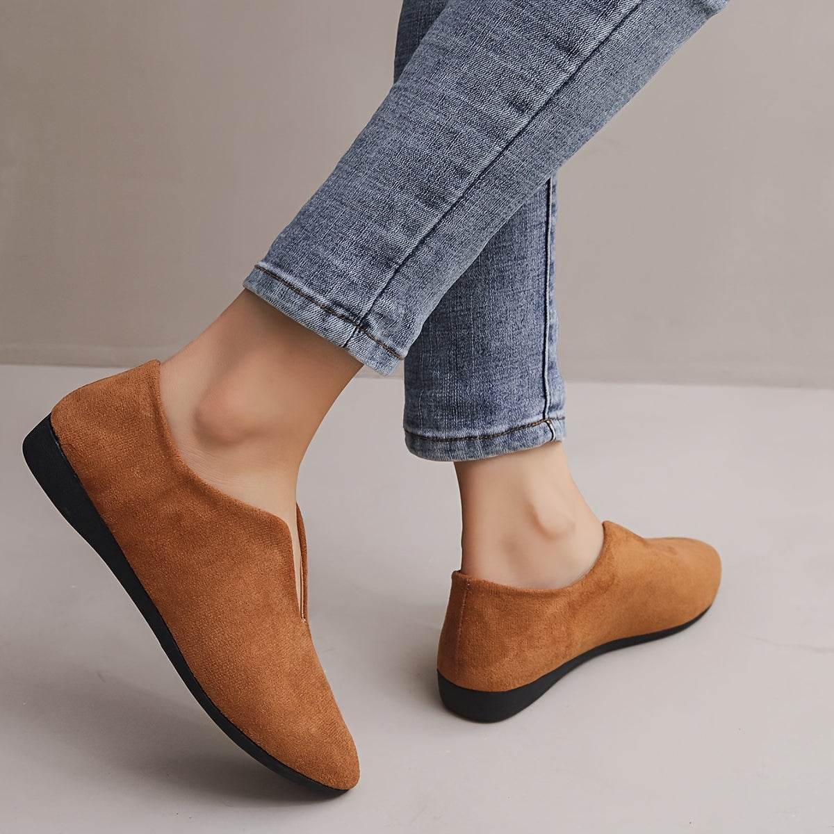 Women's solid color casual flats with a soft sole and point toe.