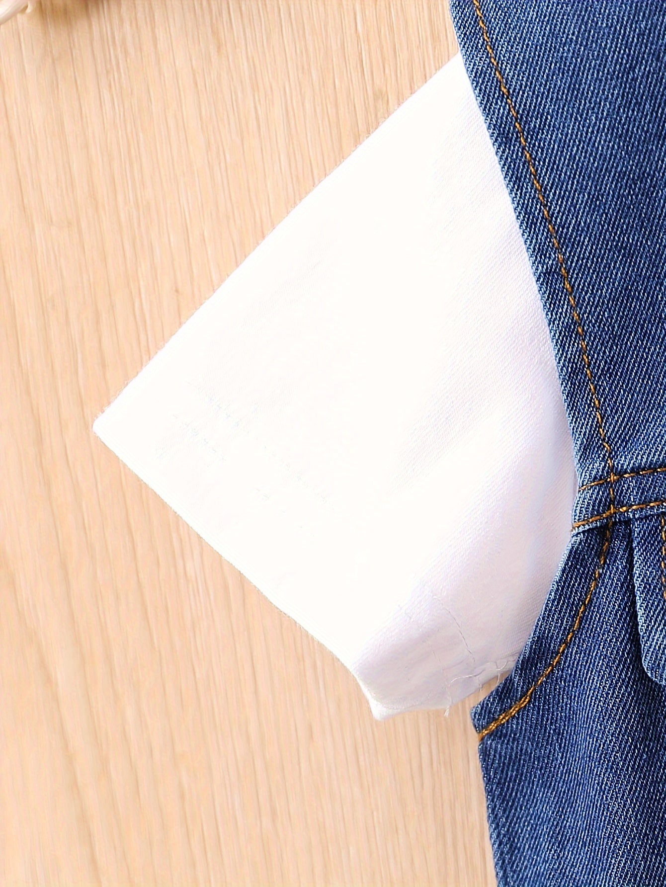 Boys' casual denim outfit with letter embroidery vest, short sleeve t-shirt, and pants.