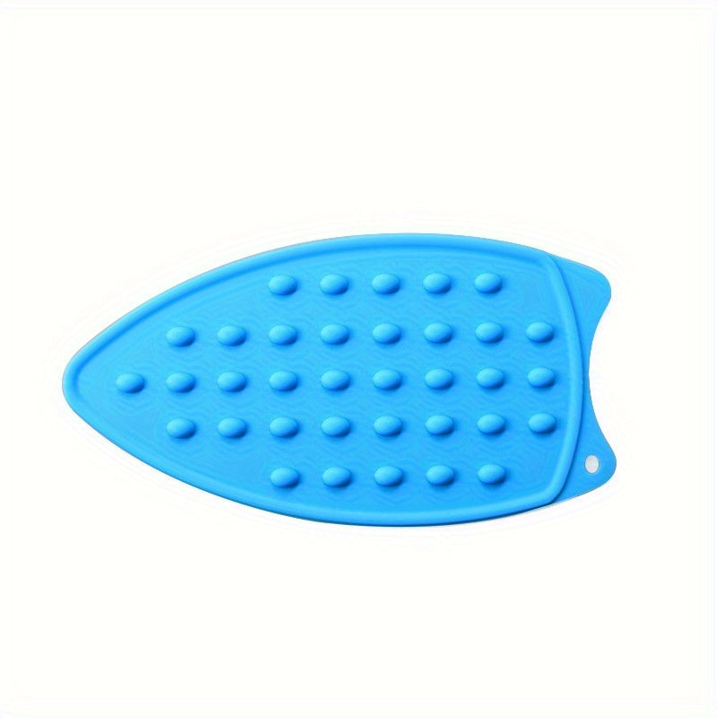 Multi-functional ironing mat made of silicone - easily foldable, extra thick and waterproof, with a non-slip backing. Ideal for use in apartments, dormitories, and travel.