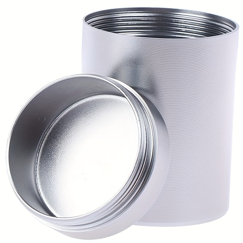 Compact and innovative, this tea packaging box is a portable canister crafted from titanium-aluminum alloy for durable and secure storage of tea leaves.