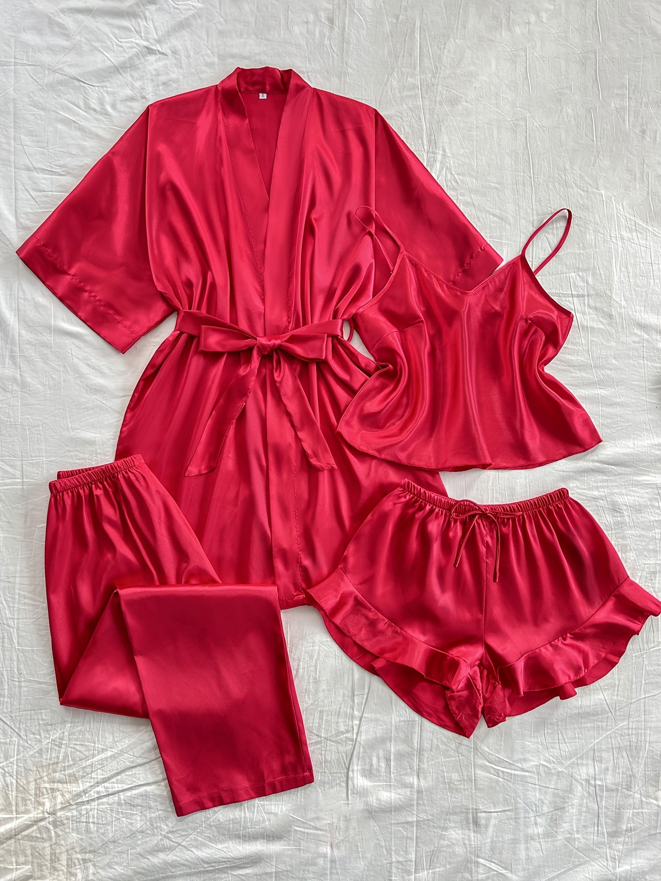 Satin 4-piece sleepwear set for women includes V-neck robe, top, shorts, and long pants in solid color. Made from 100% polyester, suitable for all seasons.