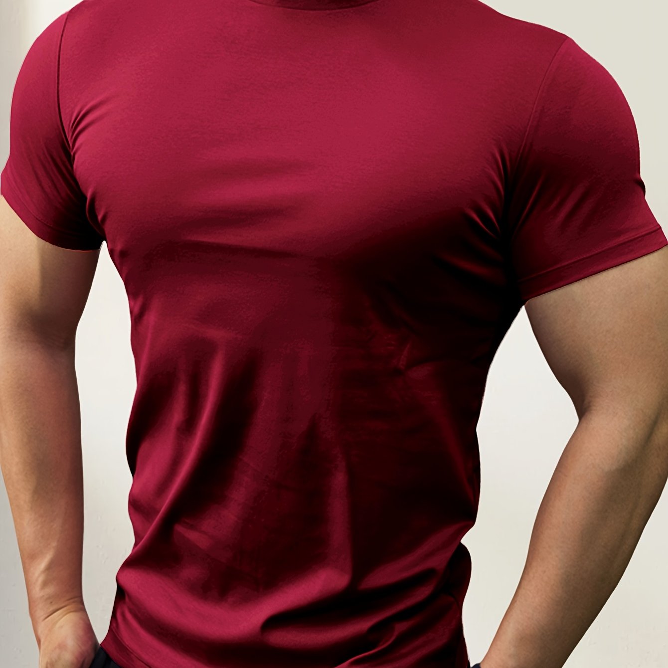 Men's slim-fit short-sleeve t-shirt with stand-up collar, ideal for outdoor activities, gym wear, or layering.