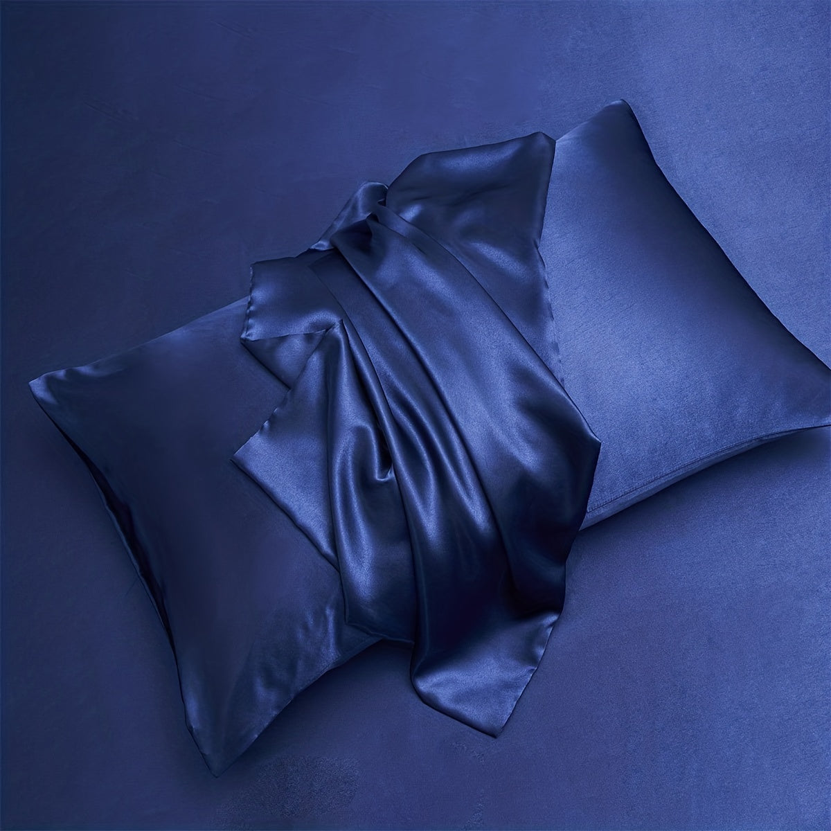 Two pieces of satin pillowcases available in solid colors perfect for the living room or bedroom. Pillow inserts are not included.