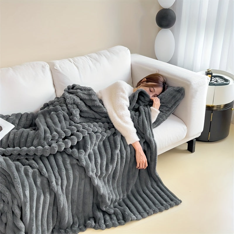 Faux rabbit fur throw blanket, perfect for staying warm indoors or outdoors. Great for napping, using in the office, or taking on camping trips. Can also be used as an air conditioning blanket. Makes a great gift for Christmas or any occasion.