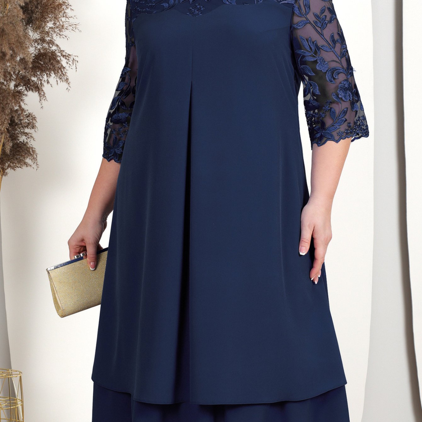 Chic plus size mother of the bride dress with embroidered chiffon patchwork and round neckline.