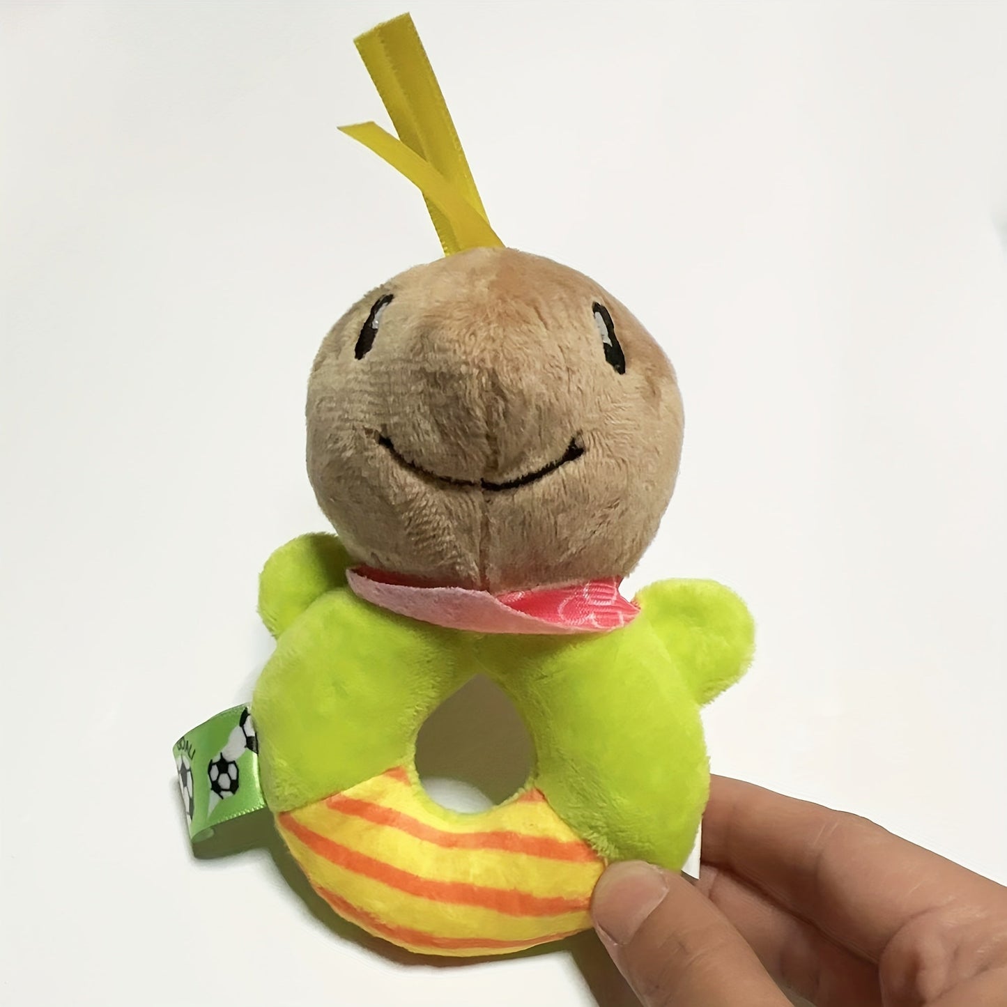 Round hand rattle baby toy with adorable cartoon animal design, a plush and cute option for your little one.