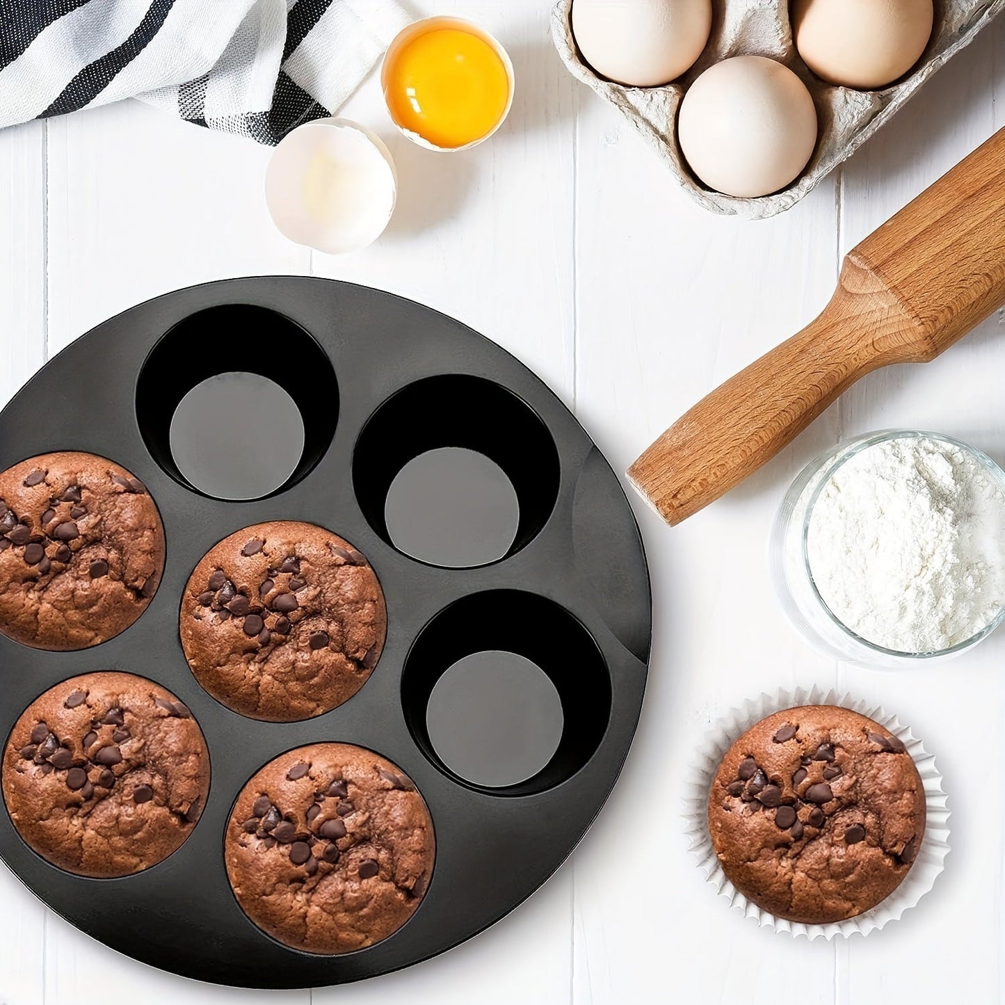 Get your hands on the Air Fryer Muffin Pan, a silicone mini cupcake mold that fits 3.7QT - 6.1QT air fryers. This versatile baking tool is a must-have kitchen gadget for all your baking needs.