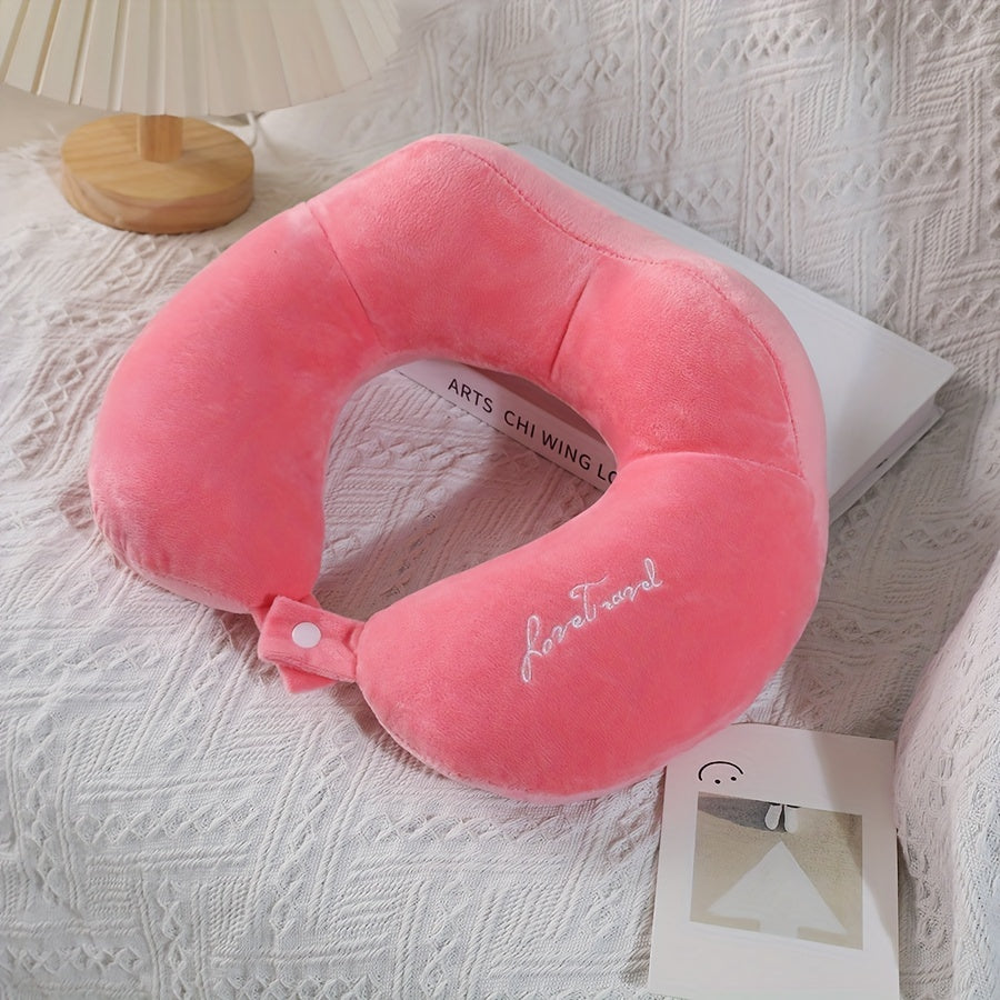 Soft and portable travel pillow in U shape, perfect for neck support on planes, trains, and cars. Ideal for a comfortable rest while traveling.