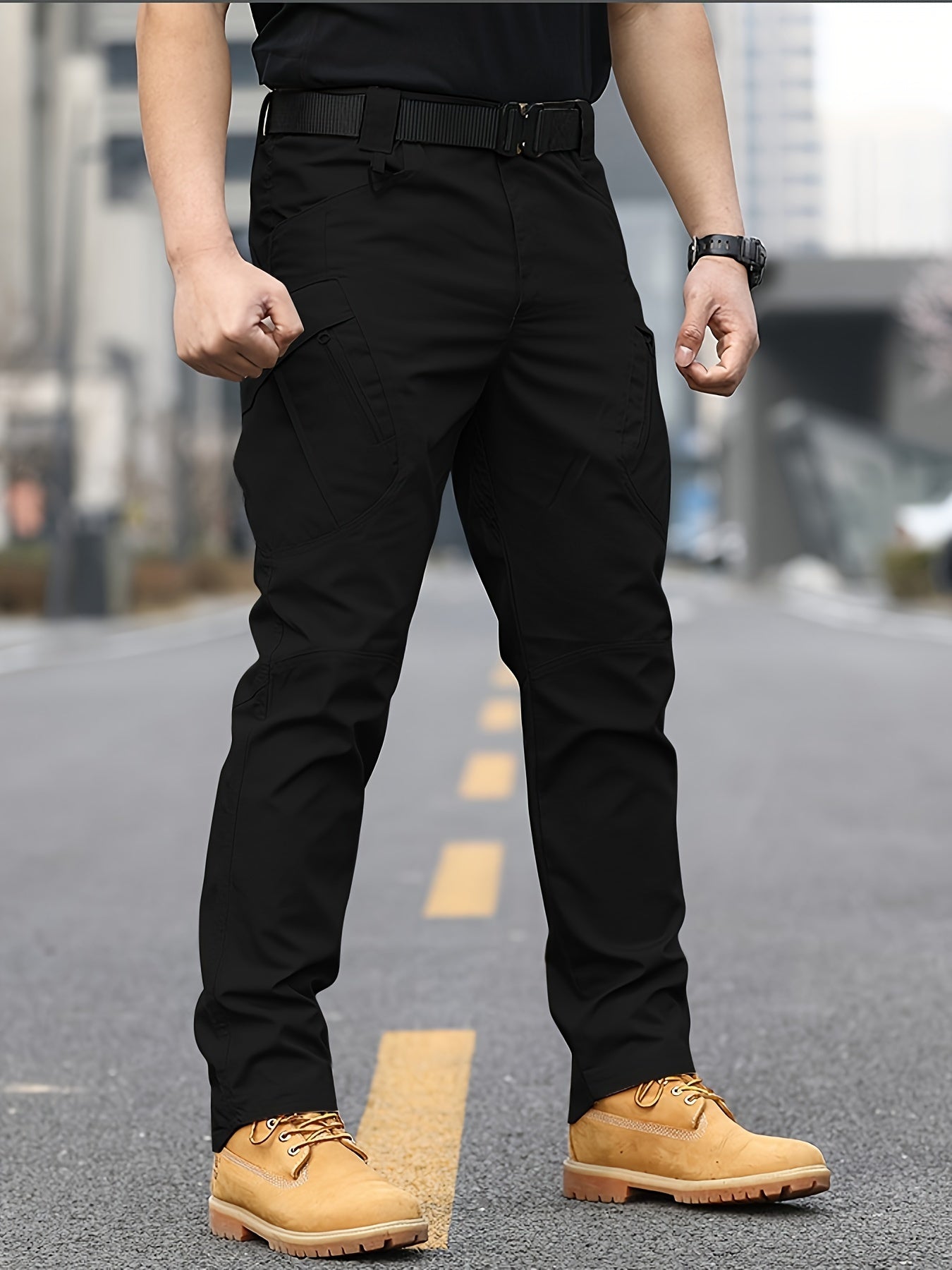 Men's slim combat pants for military training and outdoor activities, featuring a casual and tactical design.