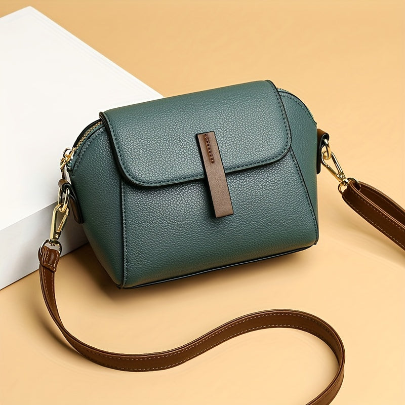 Stylish women's crossbody bag made of PU leather for daily use, measuring 7.1 x 5.1 x 3.5 inches.