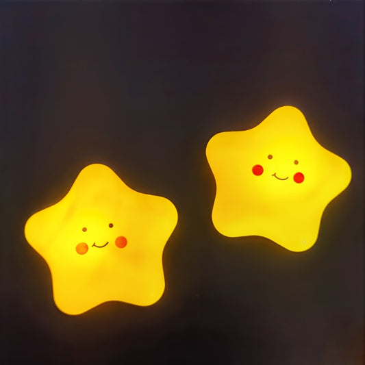 Star-shaped LED night light with cute smile expression, emits soft yellow glow, made of plastic and operates on batteries. Perfect for room decor.