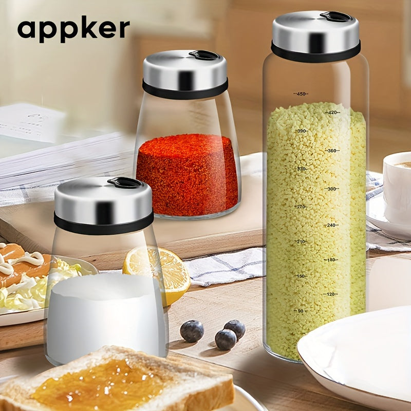 Clear glass spice jars with lids in 180ml, 300ml, and 500ml sizes, complete with spoons. Ideal for storing seasoning, salt, pepper, and other spices in the kitchen.