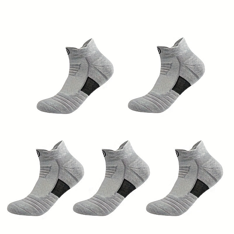 5 pairs of high-performance athletic compression socks for men in gray, black, and white. Made with breathable polyester and sweat-wicking material with a towel bottom, featuring a