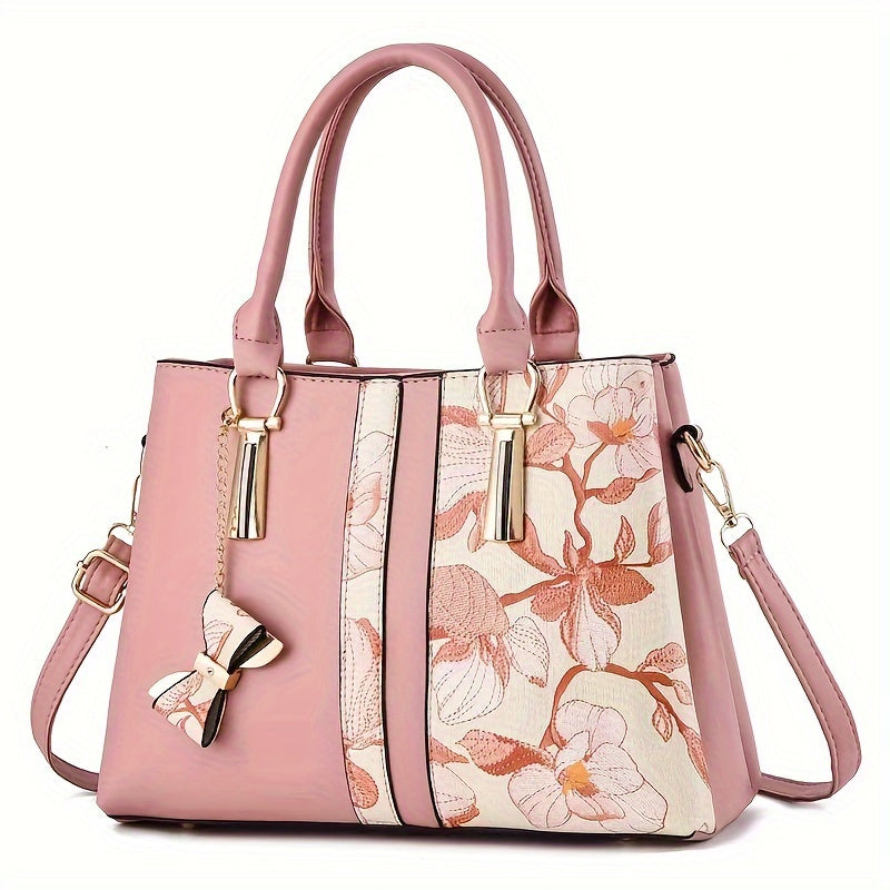 Chic floral print handbag with a spacious crossbody design.