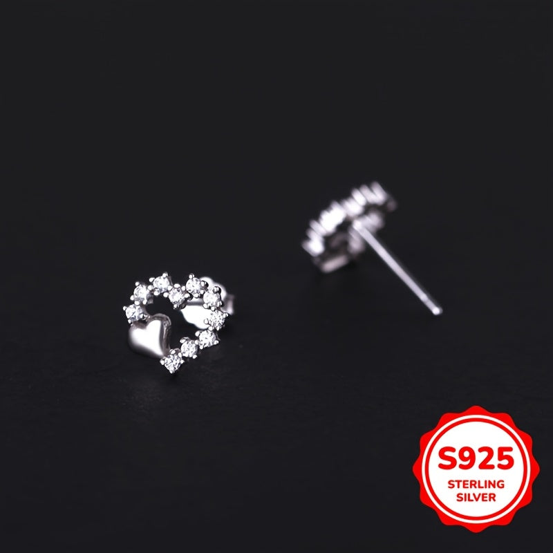 These graceful heart-shaped earrings are crafted from S925 silver with synthetic zirconia stones. Their simple and minimalist design is perfect for girls who prefer a cool and elegant style. These versatile earrings make a great gift for birthdays or