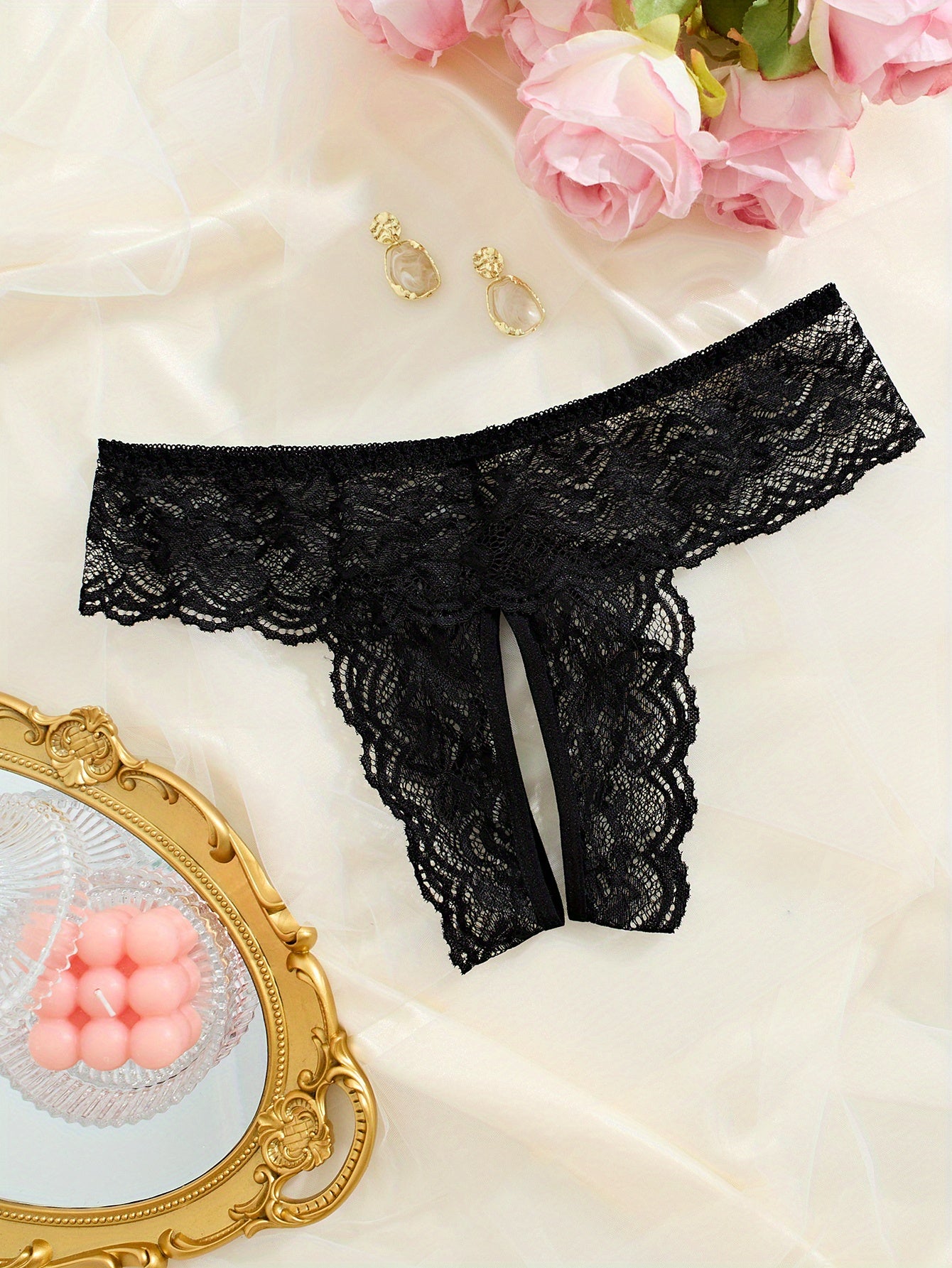 Sexy black lace panties with open crotch, low-rise design, perfect for Valentine’s Day.