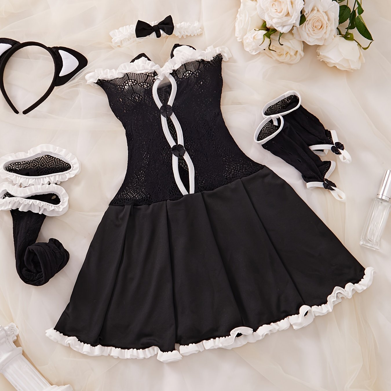 Sexy maid cosplay costume including frill-trimmed lace dress, gloves, stockings, choker, and headband.