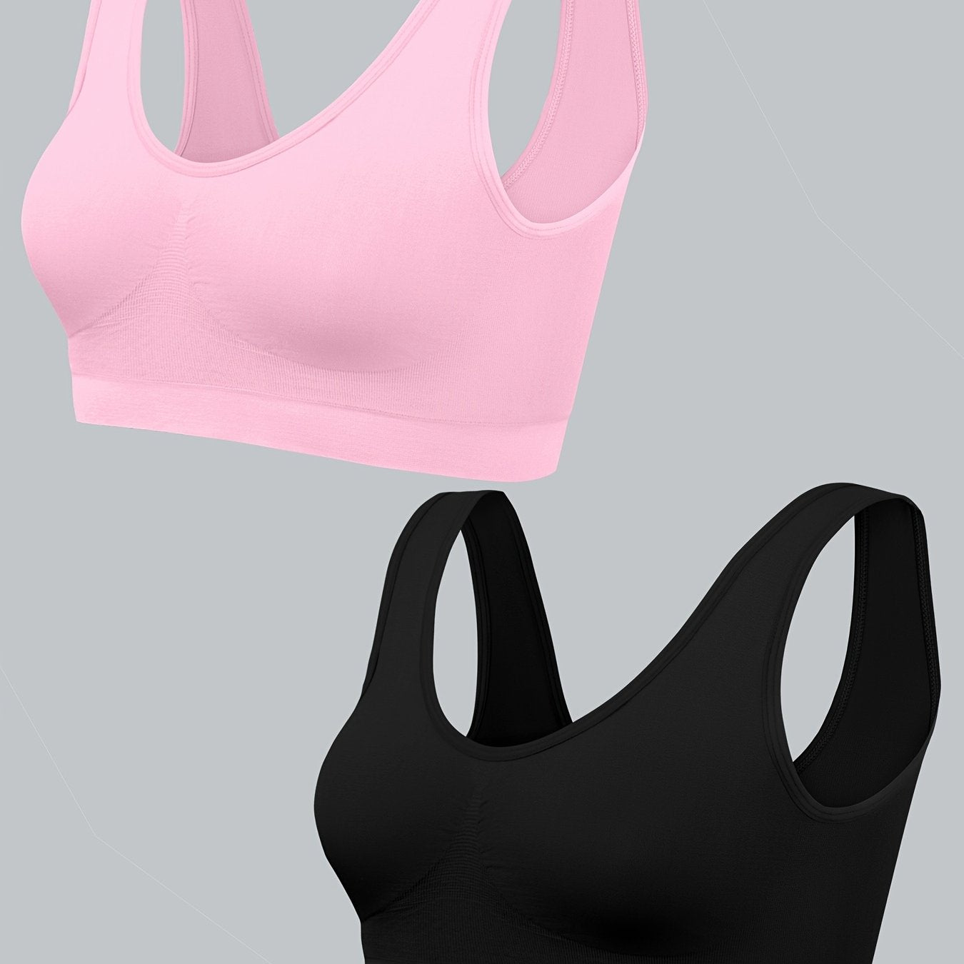 Two women's seamless, high elasticity sports bras made from solid color polyamide knit fabric. Offers high support and does not contain padding. Great for adult athletic activities.