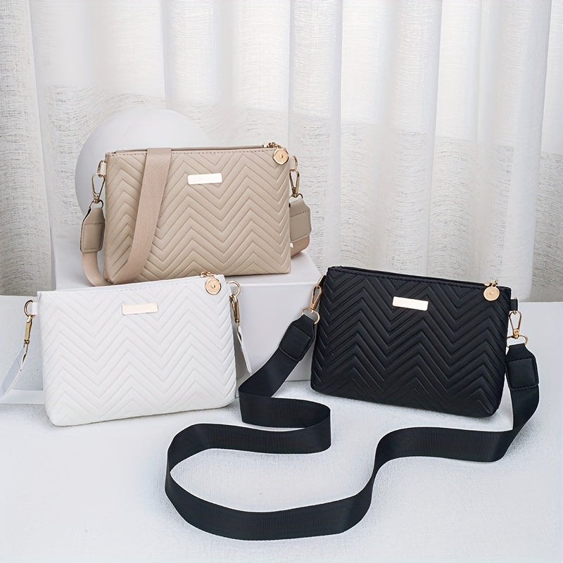 Stylish wave pattern crossbody bag with exquisite hardware and solid color versatility.