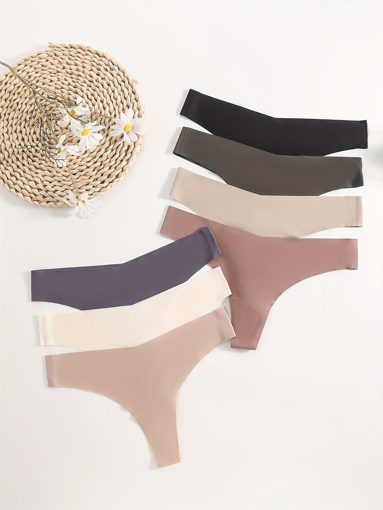 7 seamless solid thongs for women, soft and comfy intimates.