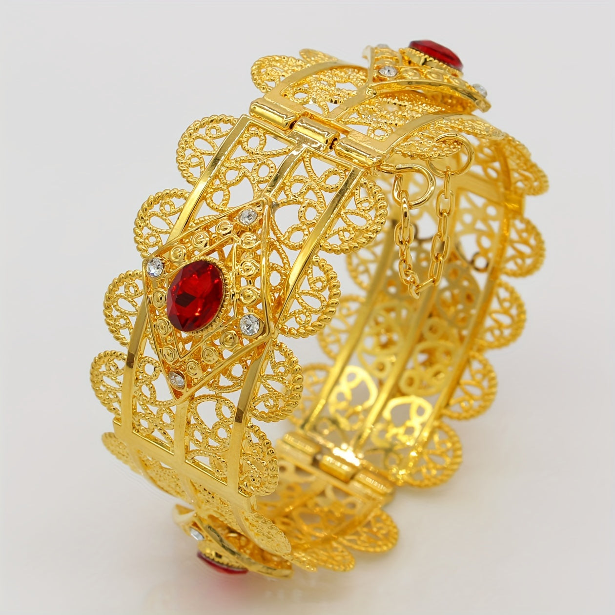 Elegant Arabian-inspired 18K Gold Plated Hollow-Out Cuff Bangle adorned with Synthetic Cubic Zirconia - Adjustable Open Bracelet perfect for Women, suitable for both everyday wear and special occasions like weddings.