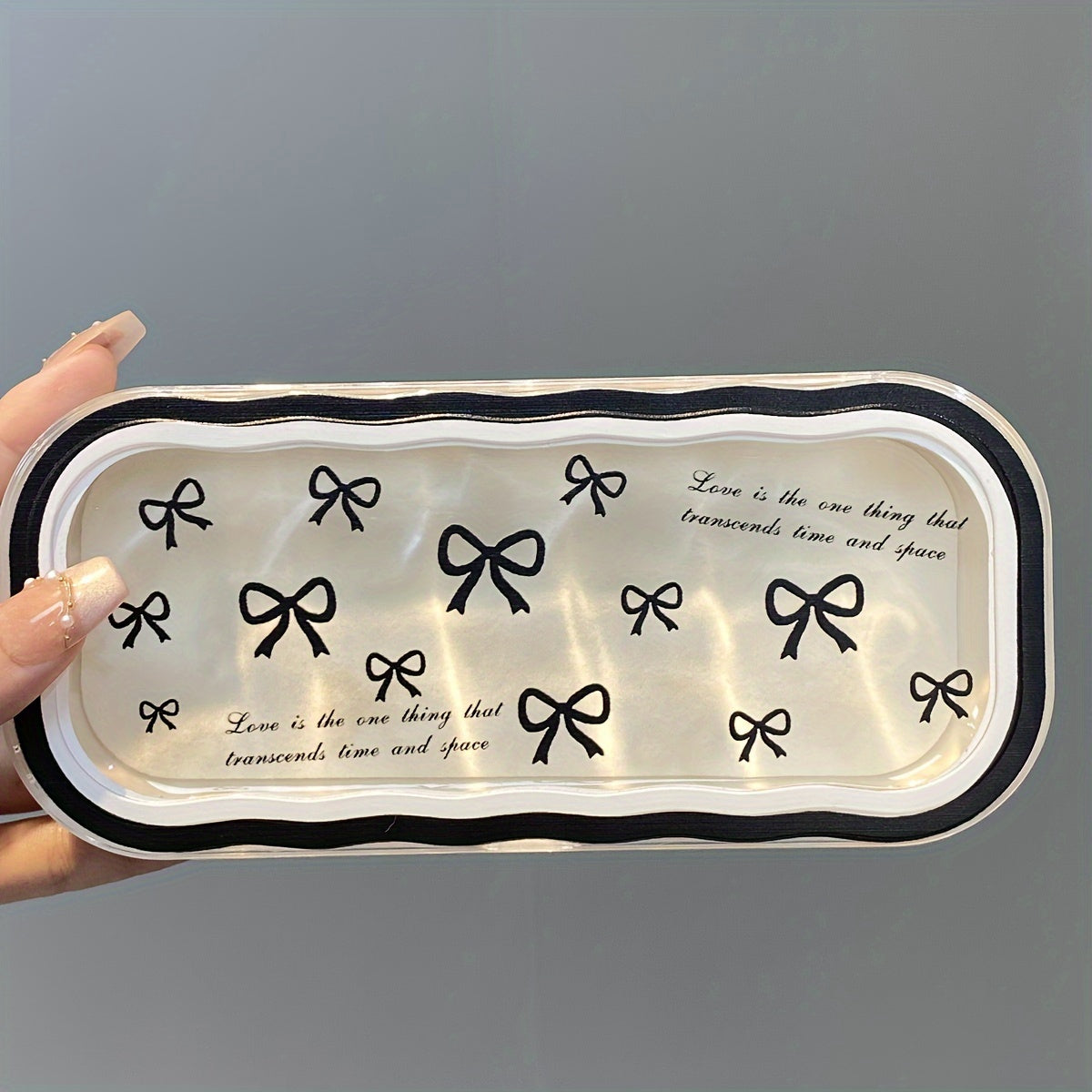 Protect your eyeglasses in style with the Bow Pattern Protective Eyeglass Case. This durable plastic case is designed for lightweight portability and features anti-pressure technology. Ideal for storing myopia eyewear and glasses, this case is part of