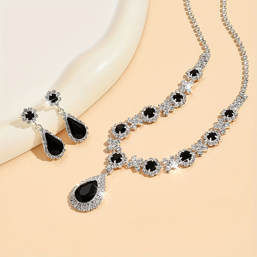 Vintage Elegant Jewelry Set: Stunning Synthetic Teardrop Rhinestone Necklace and Earrings in Silver Plated Copper. Featuring a Heart Theme and December Birthstone, this set is perfect for both Daily Wear and Party Occasions. Makes a romantic Valentine's