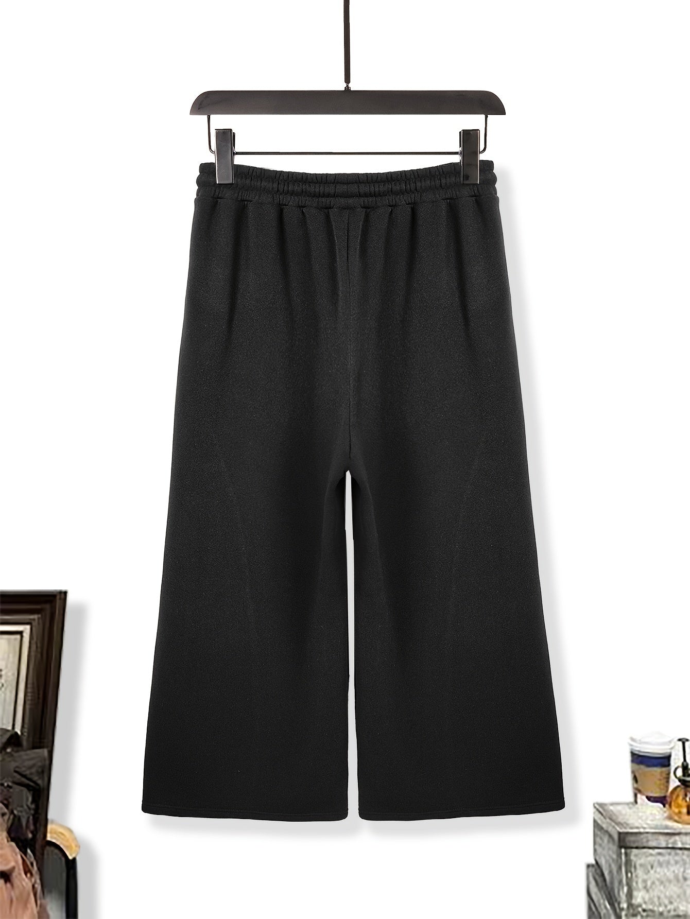 Loose fit wide leg sweatpants for men, ideal for casual sportswear.