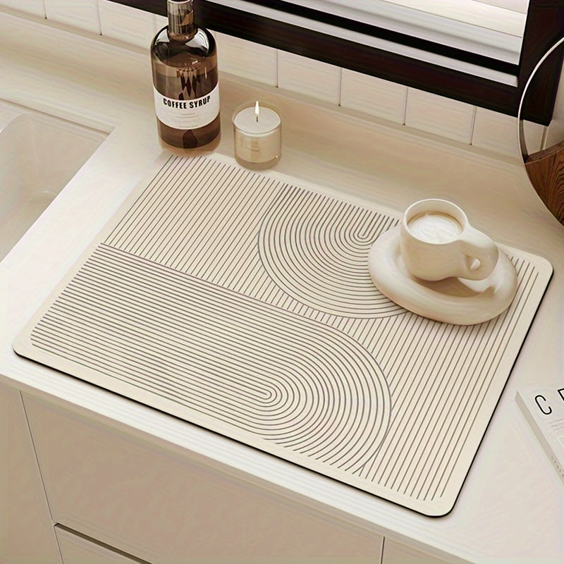 One piece of Pan Drying Mat that also functions as a Coffee Machine Surface Absorption Mat, Coffee Mat, Washstand Diatomium Drain Mat, Soft Faucet Suction Mat for kitchen supplies.