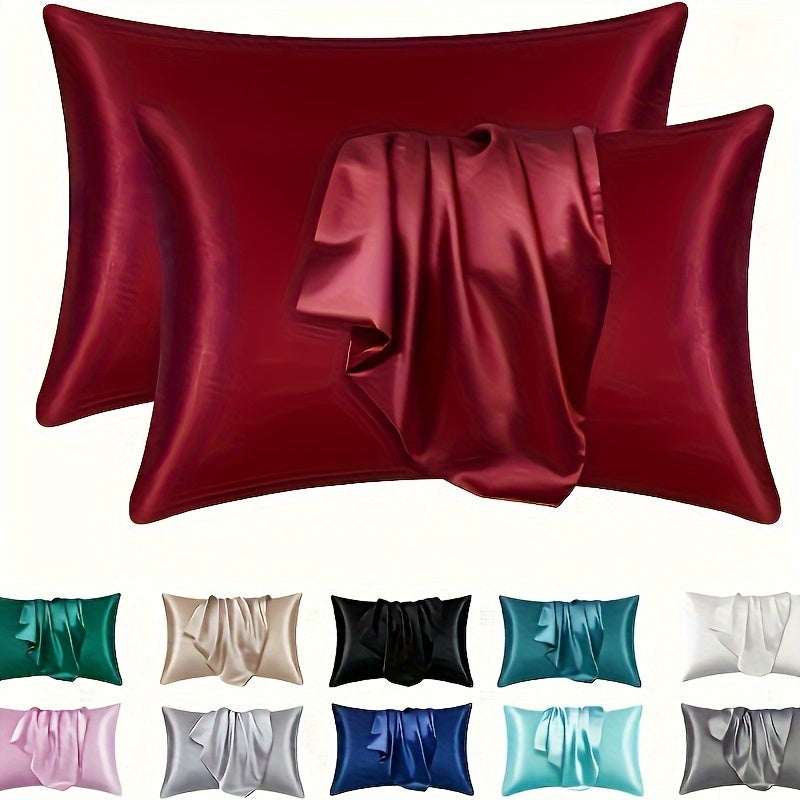 Two luxurious silky soft pillowcases with breathable and skin-friendly cooling feel. Solid color with envelope closure. Machine washable. Set of two.