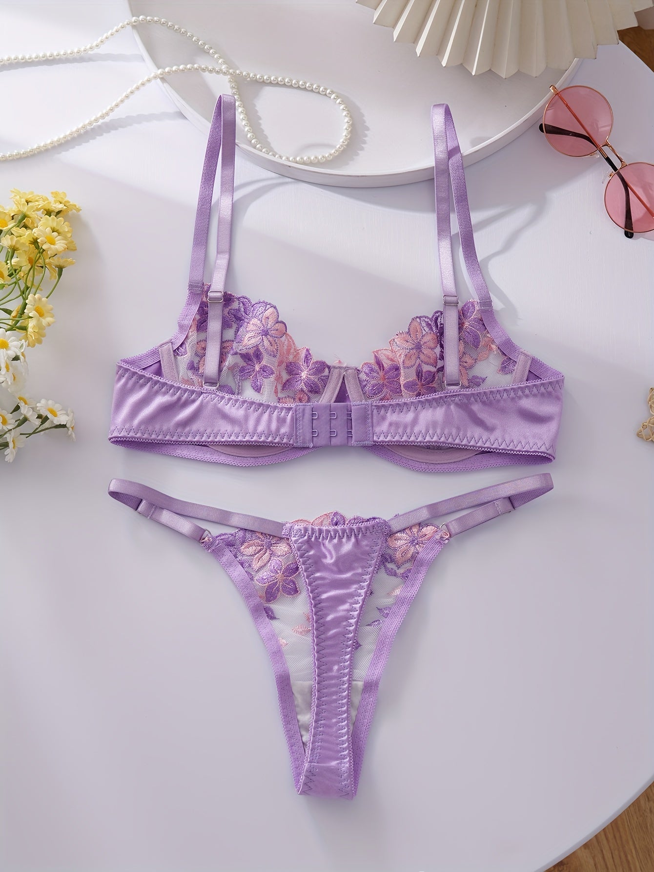 Floral embroidered lingerie set for women, featuring a sexy floral pattern, made from a blend of polyester and elastane. The set includes a medium support bra with underwire and no padding