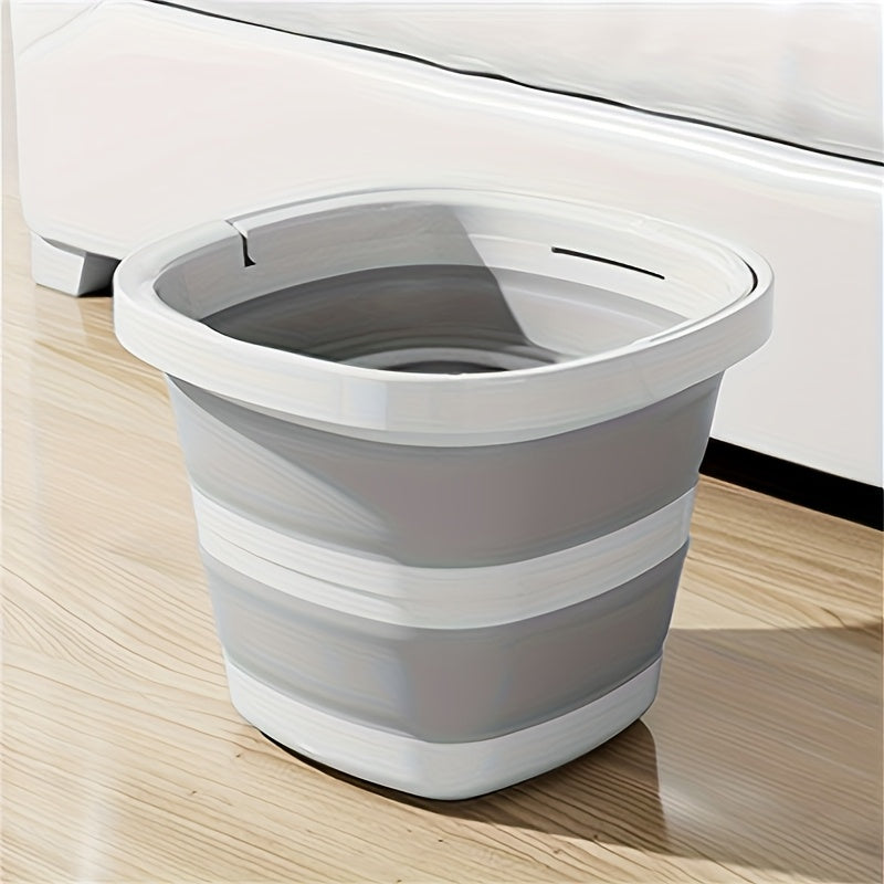 Durable folding bucket with handle, space-saving design. Portable for car wash, camping, fishing, and home use. Creamy white and granny grey plastic bucket.