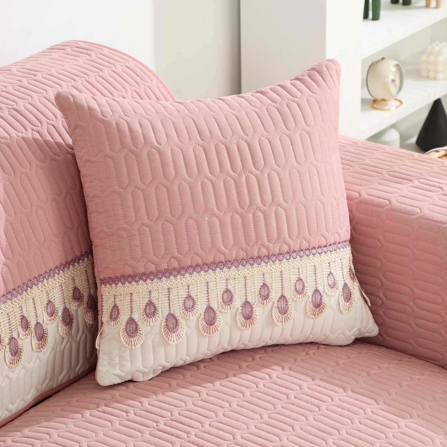 Luxurious Feather Embroidery Quilted Sofa Cover enhances and protects your couch.