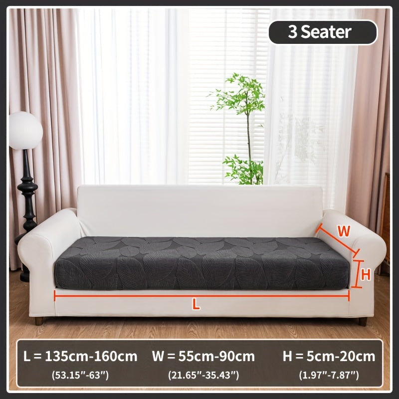 Waterproof elastic sofa cover suitable for all seasons, featuring a modern non-slip design for living room or office decor.