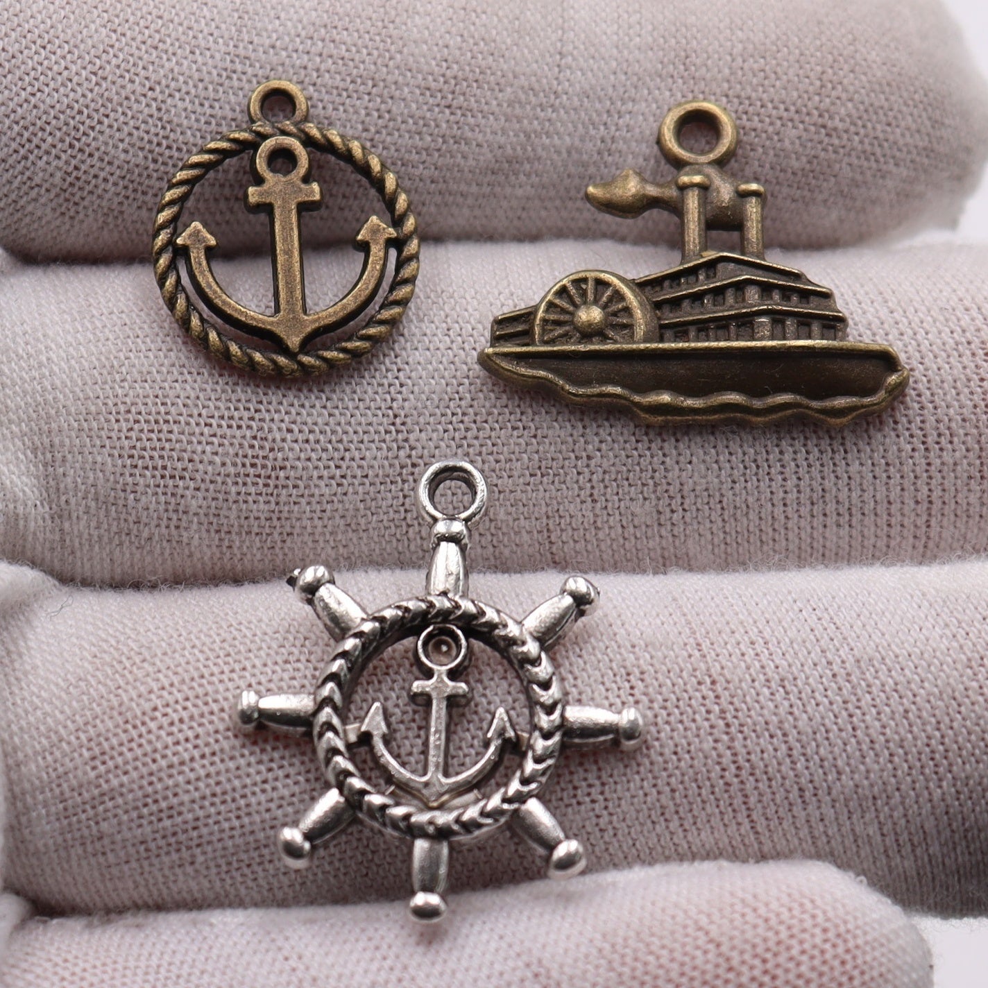 Set of 30 Assorted Pirate-themed DIY Jewelry Pendants, featuring Retro Alloy Anchor, Rudder, Compass, and Ship Wheel designs, perfect for creating Nautical Style Jewelry