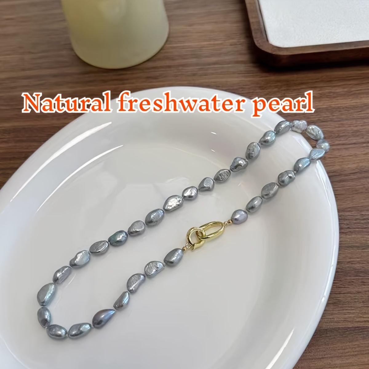 Beautiful French-inspired freshwater pearl necklace featuring distinctive gray baroque pearls, perfect for adding a touch of elegance to any outfit. Whether paired with casual attire or worn for a special occasion, this necklace is versatile and chic