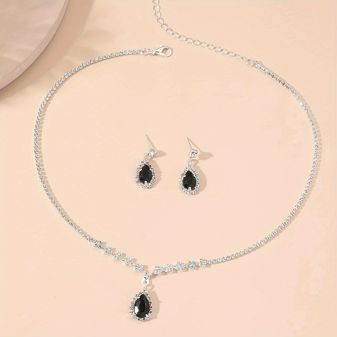 European and American trendy claw chain necklace and earrings set with zirconia for wedding, party, or gift.