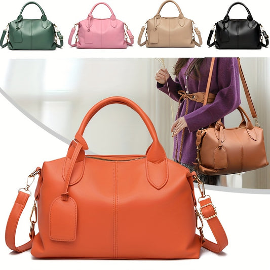 Stylish shoulder bag with removable strap and zip closure, perfect for everyday use.