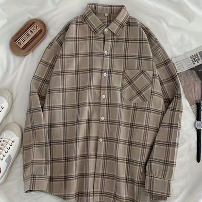 Vintage plaid shirt for large women with loose fit and long sleeves.