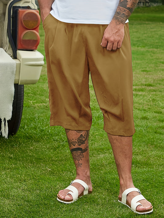 Breathable loose-fit solid capri pants for plus-size men, perfect for summer.