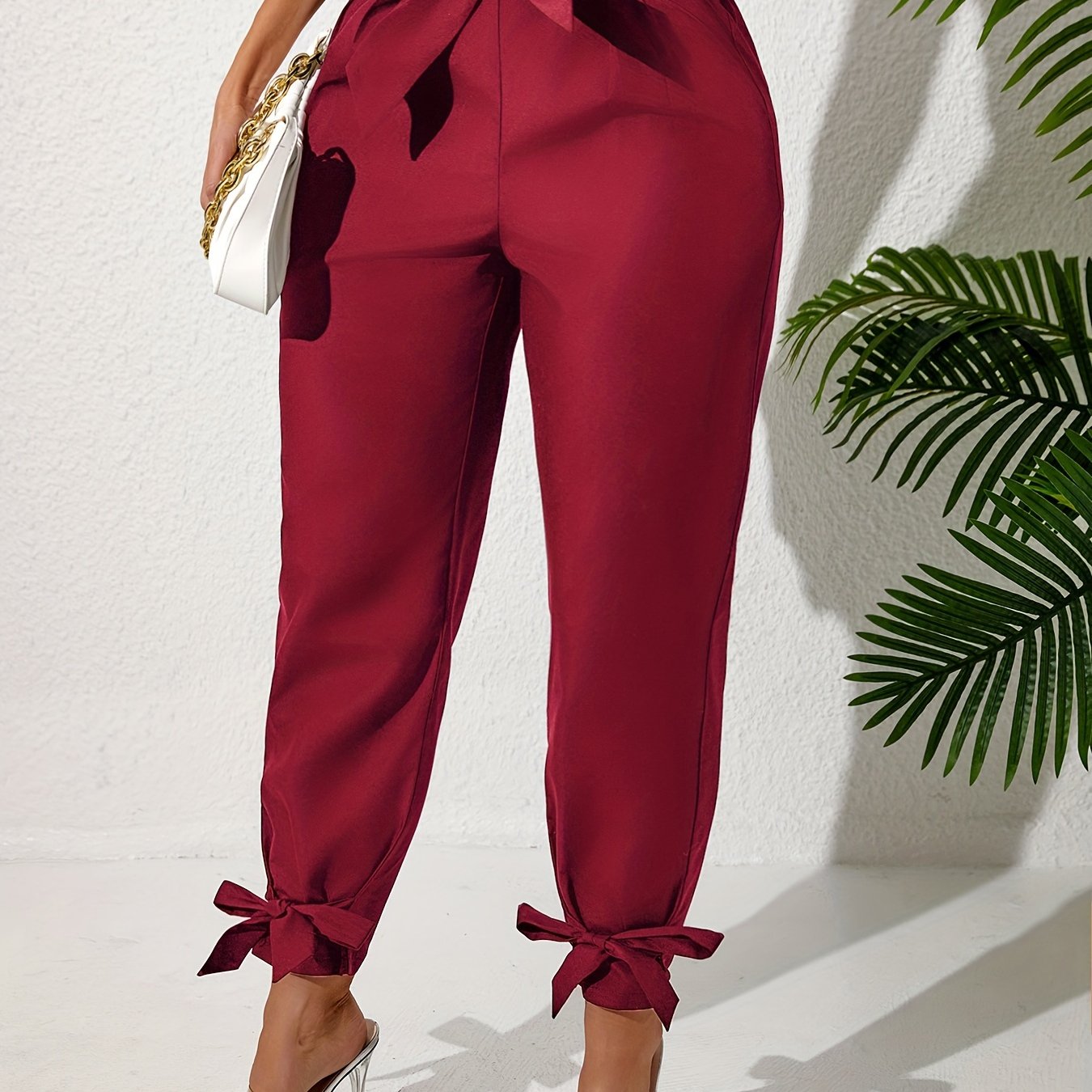 Solid straight leg pants with elastic drawstring waist and elegant bow detail. Perfect for spring and summer in plus size.