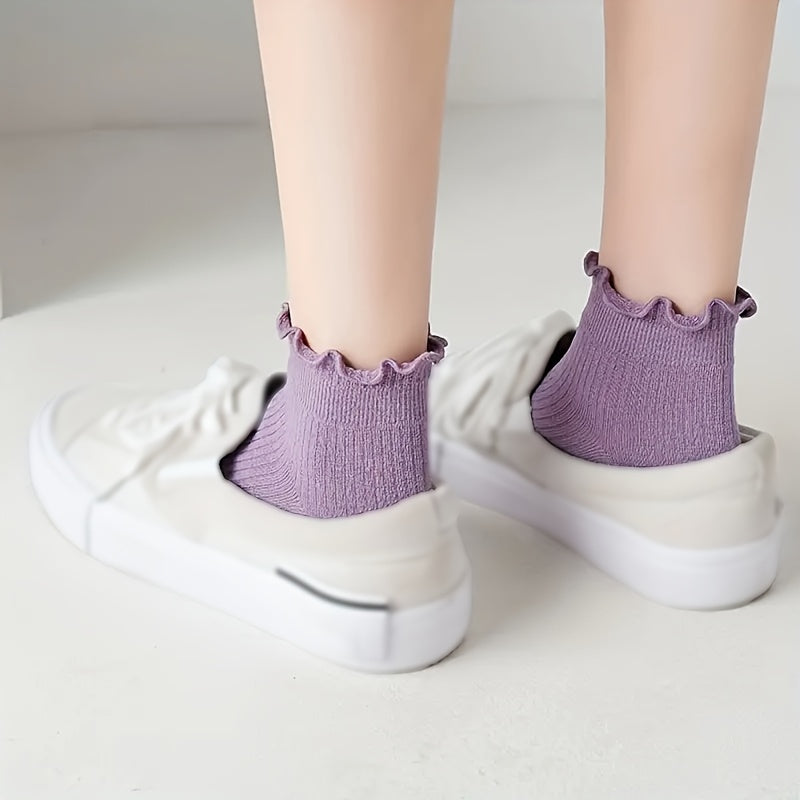 10 pairs of cute, comfortable women's ankle socks made from 95% polyester and 5% elastane. Solid color knit fabric that is machine washable.