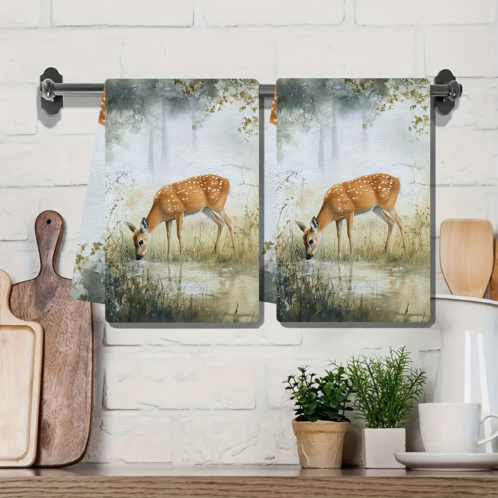 Set of 2 Ultra Soft Kitchen Towels featuring a Serene Deer Grazing Scene. These highly absorbent and machine washable dish hand towels are in a Contemporary Style, measuring 40.64x60.96 cm. Perfect for Holiday Decor and ideal for use as dish towels.