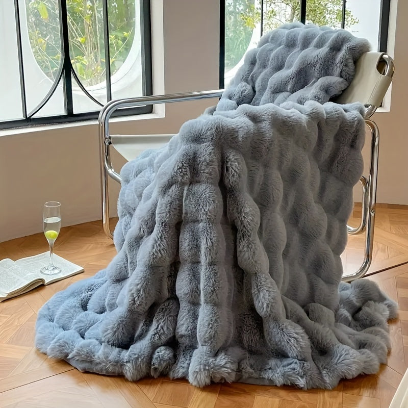 One piece of decorative soft and thick fuzzy faux rabbit fur throw blanket for couch or sofa. This reversible plush warm fleece blanket is perfect for winter, providing luxury and coziness. The cute and furry cream white blanket is also ideal for bed.